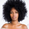 Coupe de cheveux frisés femme 50 ans visage rond